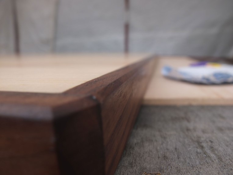 Chamfer detailing on the walnut lip